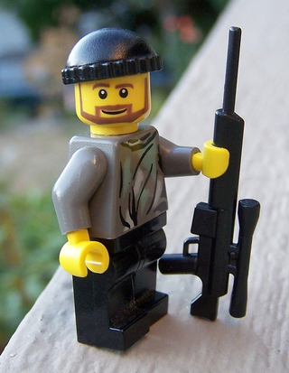 Illustration for article titled LEGO Arms Dealer Sells Everything from AK47 to Uzi